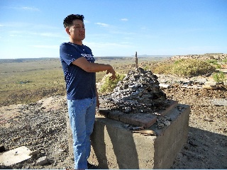 jake_koopee_firing_pottery_on_first_mesa