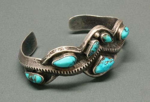 Navajo Bracelet of Silver with 7 Turquoise Stones