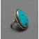 Large Oval Turquoise Ring with Silver Trimwork